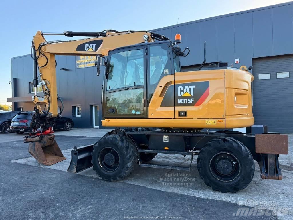 CAT M315F حفارات بعجل
