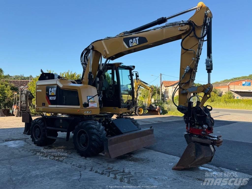 CAT M315F حفارات بعجل