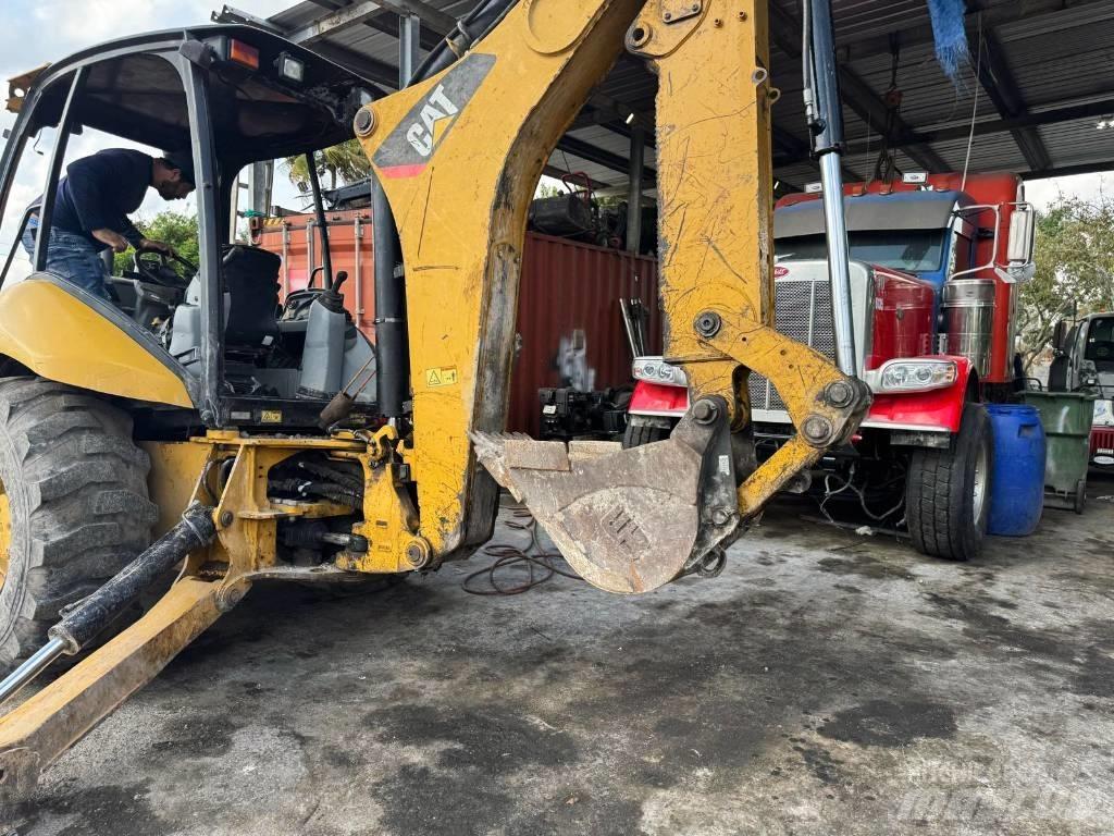 CAT 420 E لوادر ذات جرافات عكسية