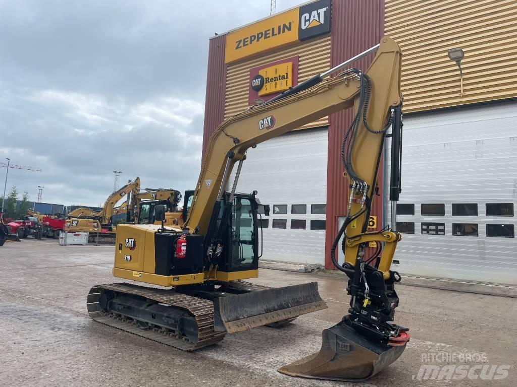 CAT 310 حفارات زحافة