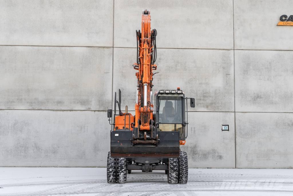 Doosan DX 140 W-3 حفارات بعجل