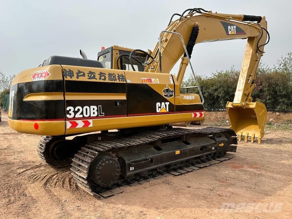 CAT 320 B حفارات زحافة