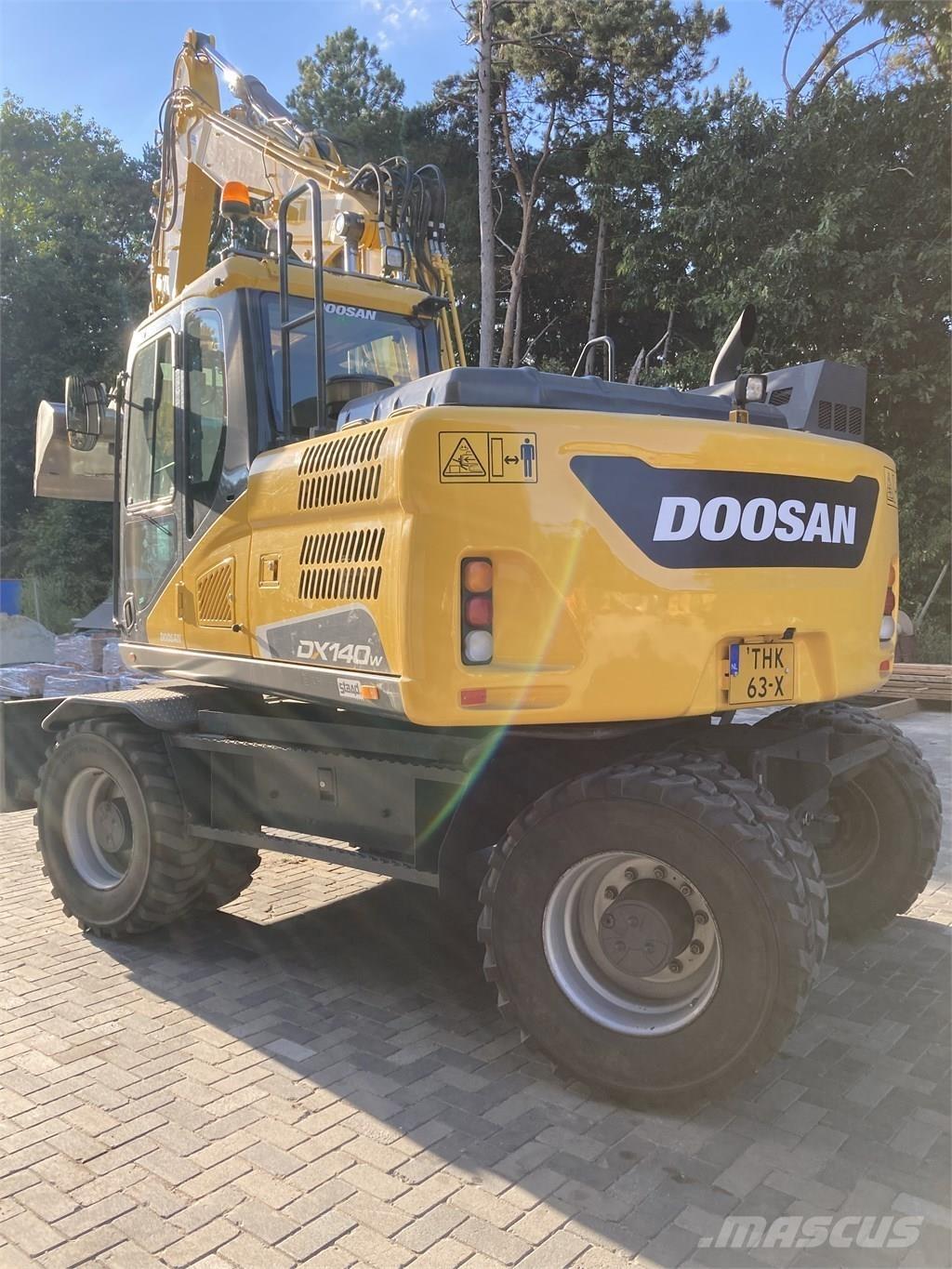 Doosan DX140W-5 حفارات بعجل