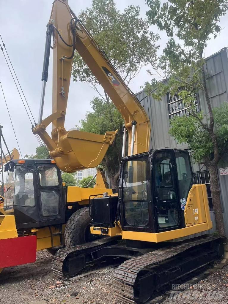 CAT 310 حفارات زحافة
