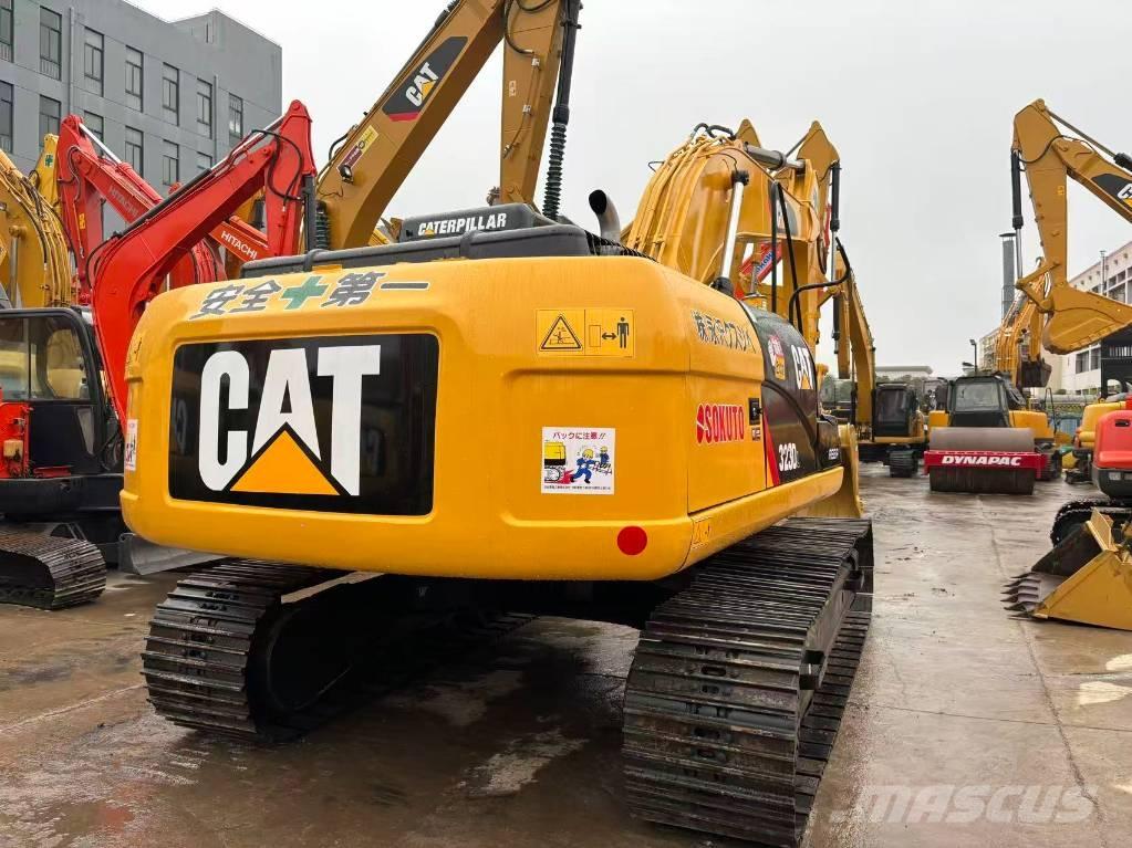 CAT 323 D L حفارات زحافة