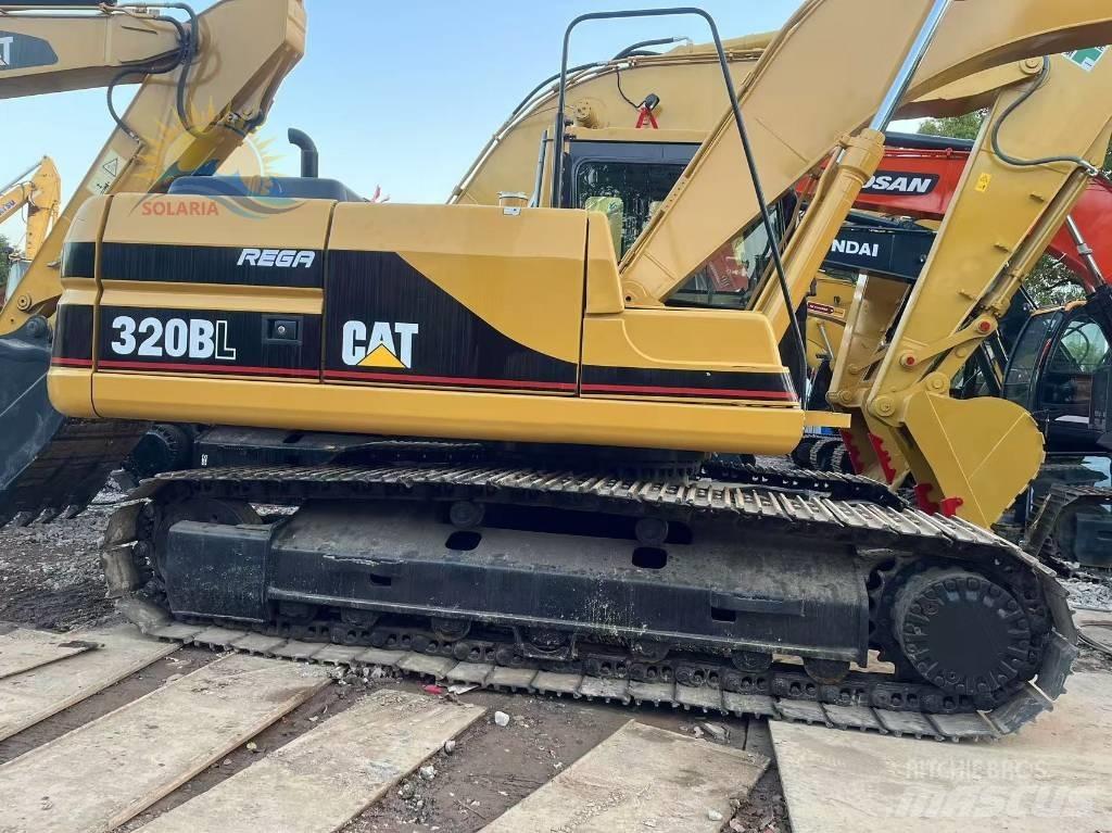 CAT 320 B L حفارات زحافة
