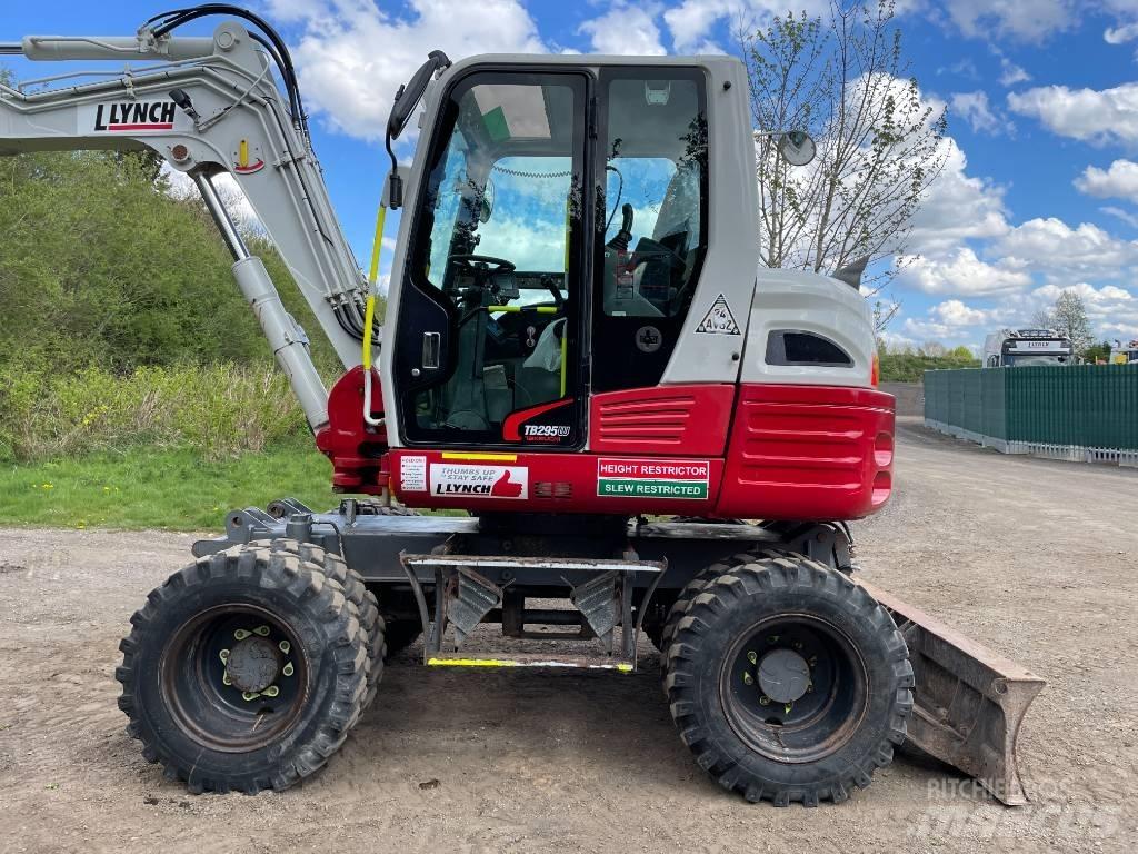 Takeuchi TB 295 W حفارات بعجل