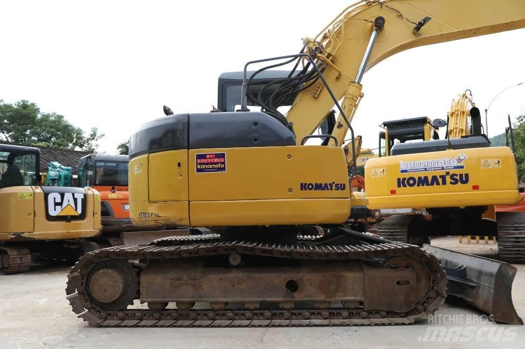 Komatsu PC 128 US حفارات وسط 7 طن - 12 طن