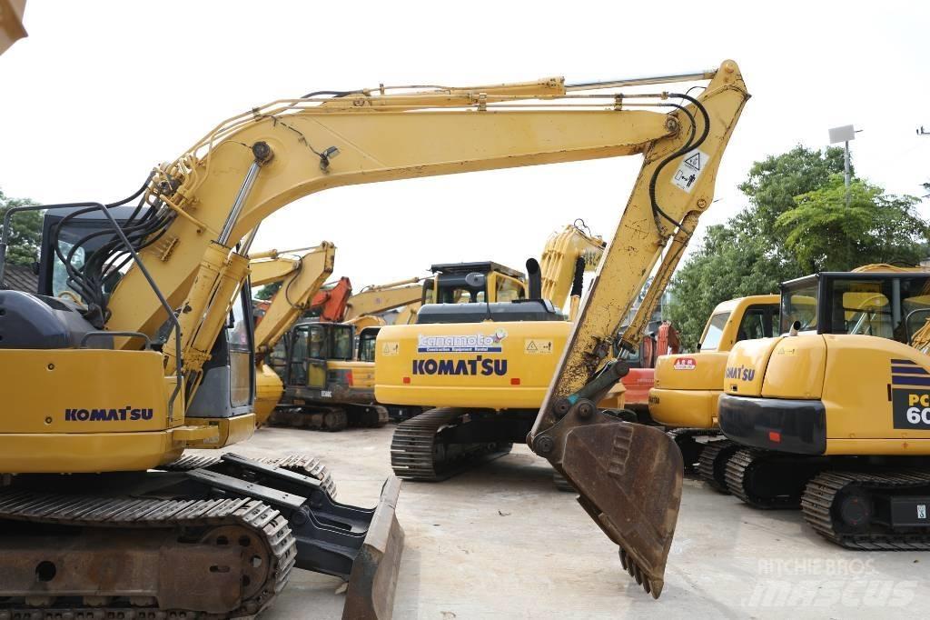 Komatsu PC 128 US حفارات وسط 7 طن - 12 طن