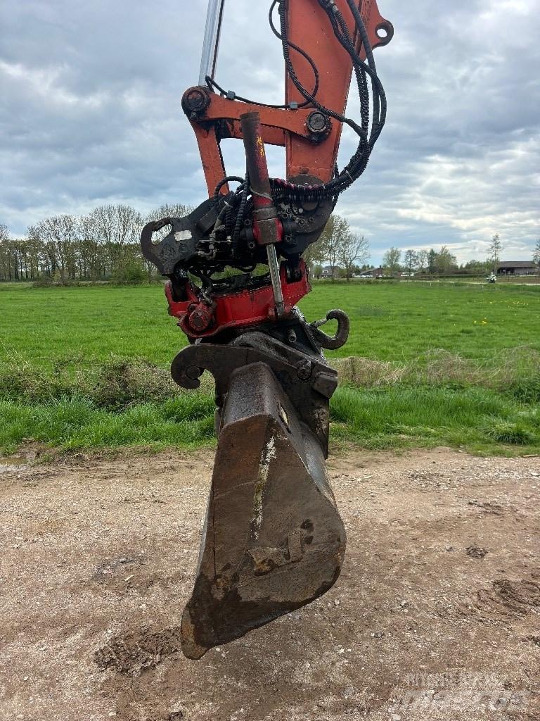 Hitachi ZX 140 W T-3 حفارات بعجل