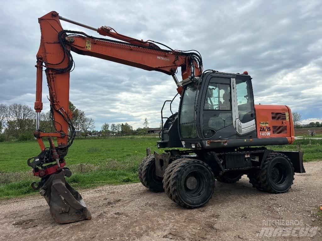 Hitachi ZX 140 W T-3 حفارات بعجل