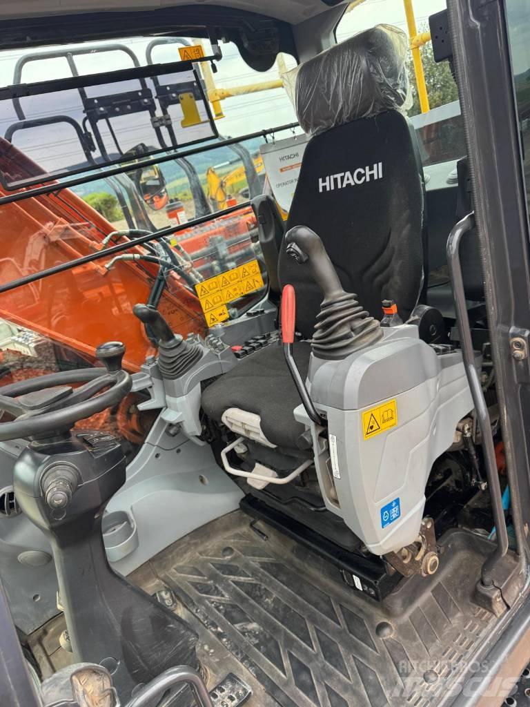 Hitachi ZW 180 حفارات بعجل