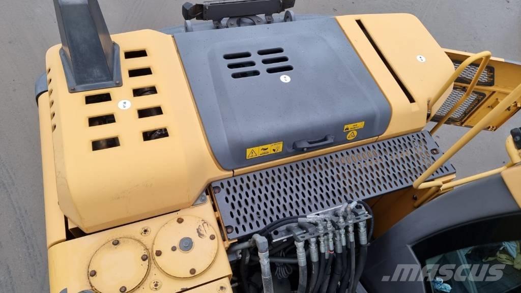 Volvo EW 140 D حفارات بعجل