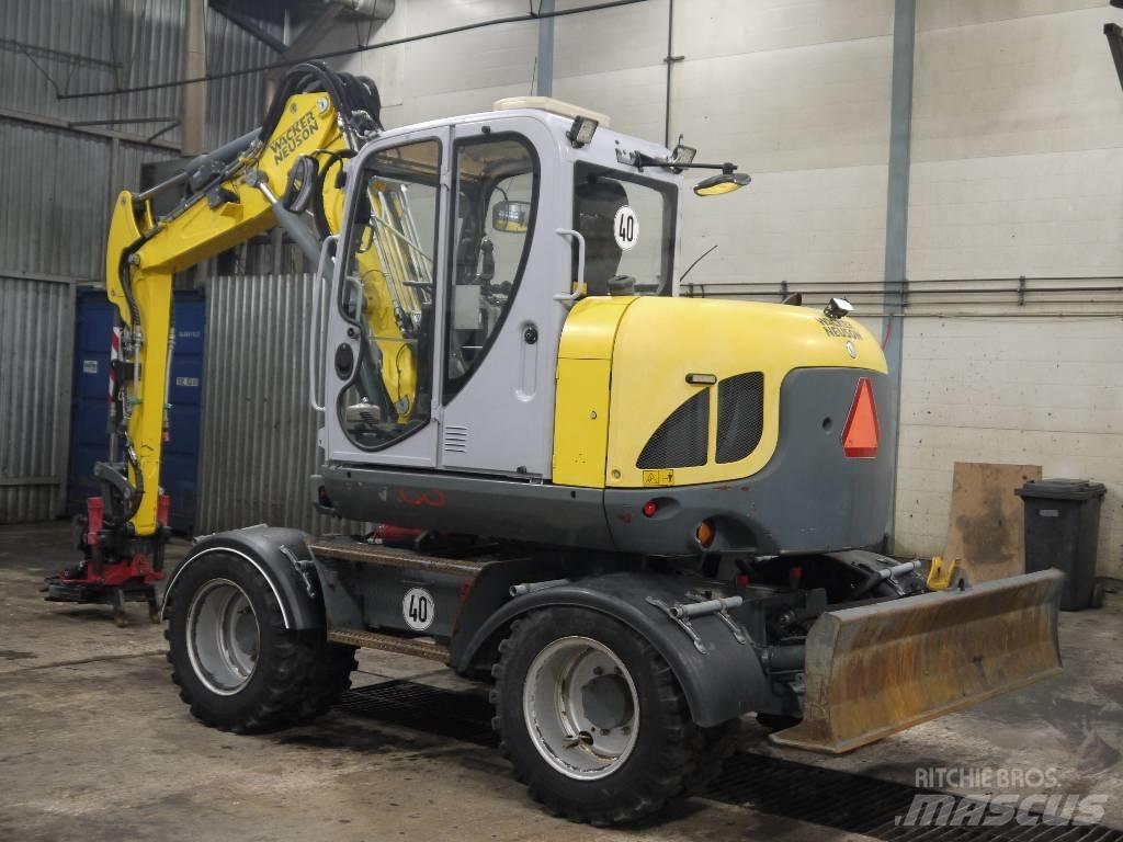 Wacker Neuson EW 100 حفارات بعجل