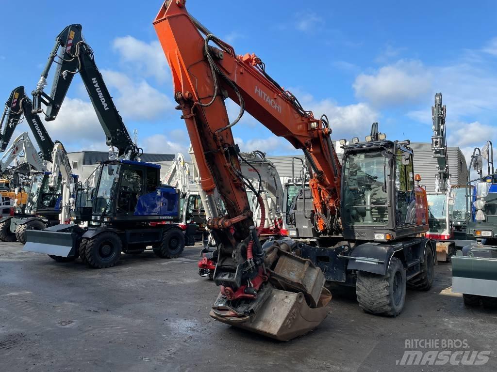 Hitachi 140W-6 حفارات بعجل