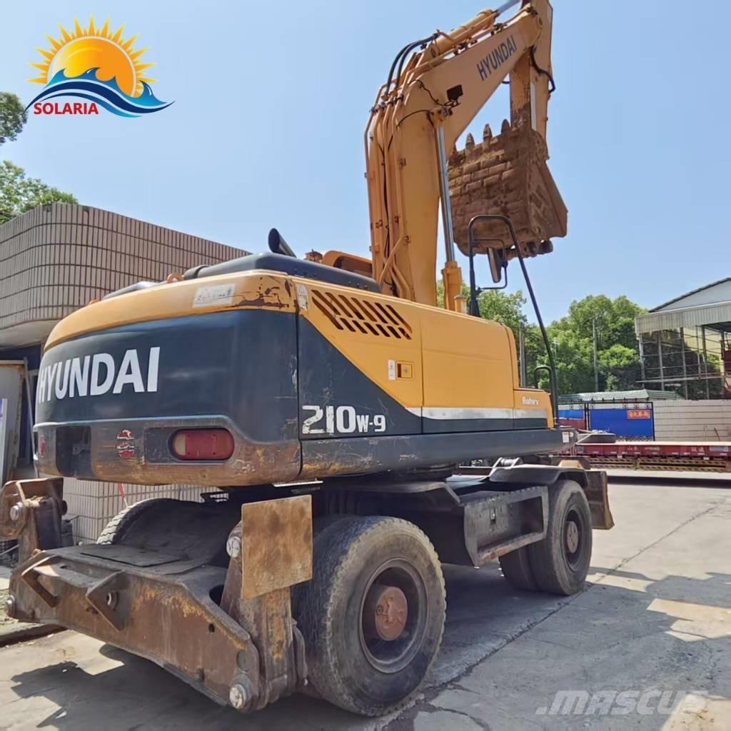 Hyundai R210W-9 حفارات بعجل