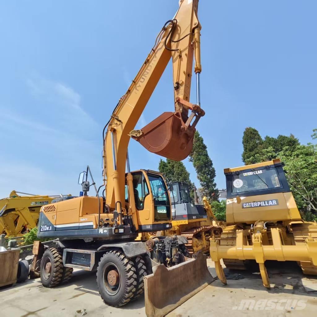 Hyundai R210W-9 حفارات بعجل