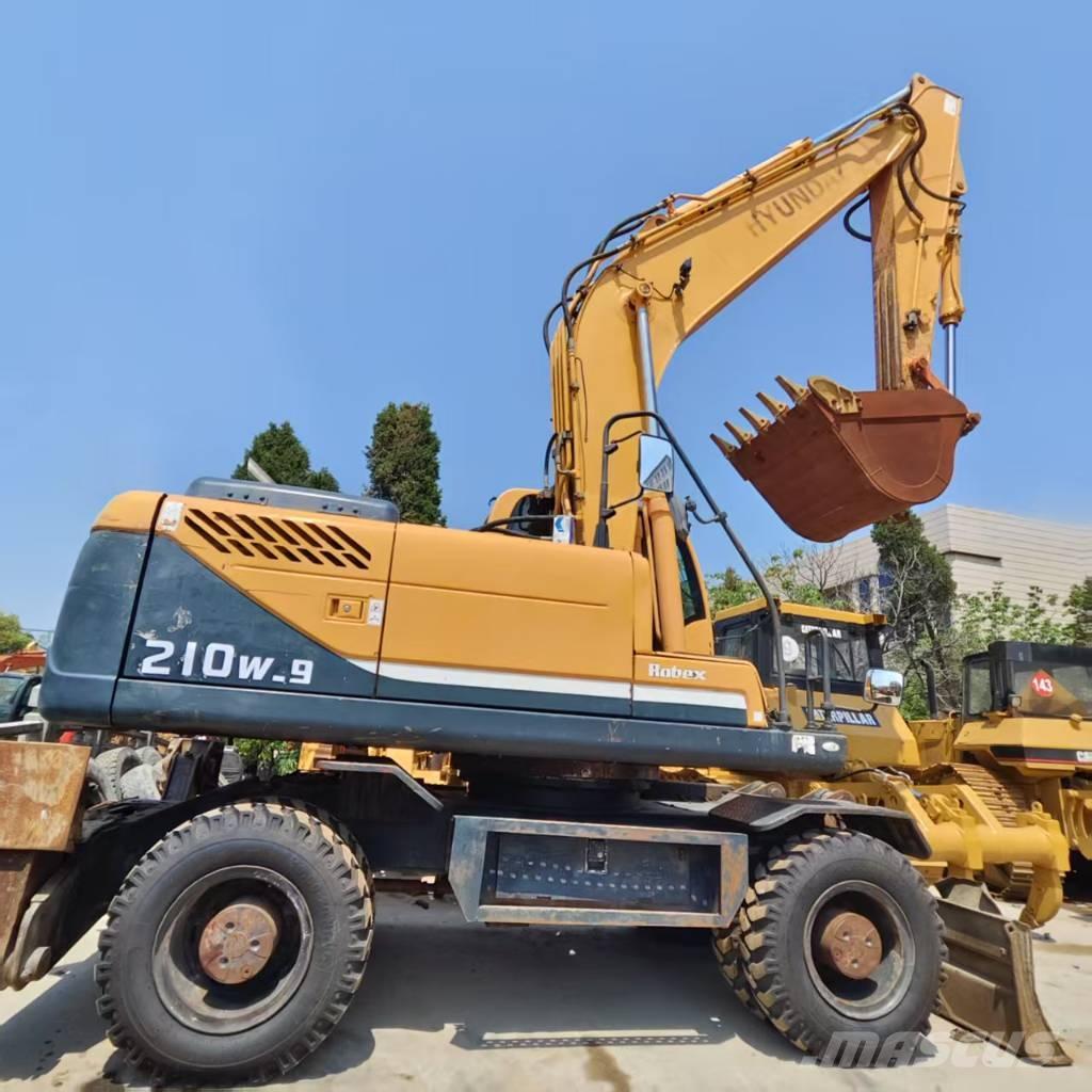 Hyundai R210W-9 حفارات بعجل