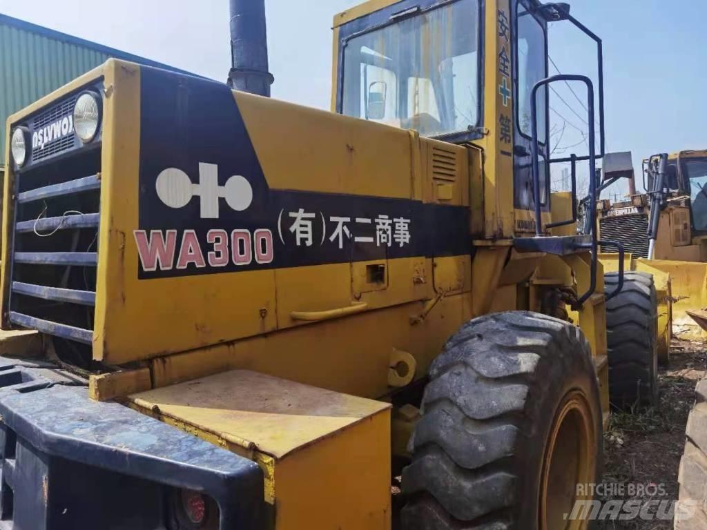 Komatsu WA 300 لوادر بعجل