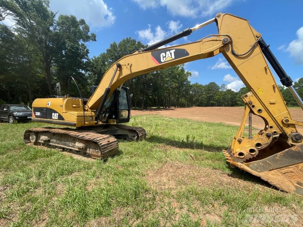 CAT 320 D L حفارات زحافة