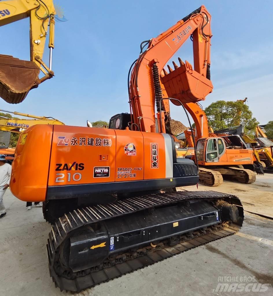Hitachi ZX 210 حفارات زحافة