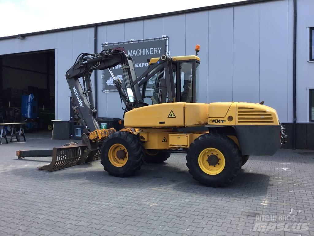 Mecalac 12 MXT حفارات بعجل