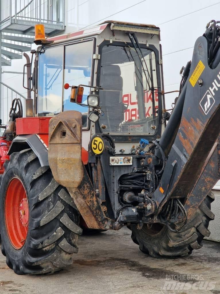 Huddig 1160 لوادر ذات جرافات عكسية