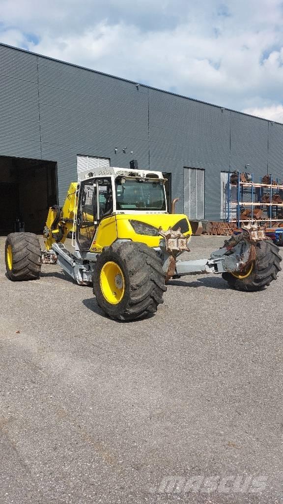 Menzi Muck M545 حفارات بعجل