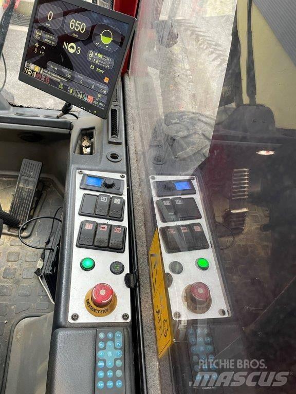 Komatsu 931.2 حصادات