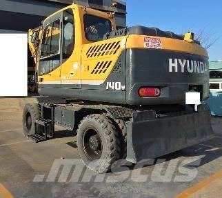 Hyundai Robex 140 W حفارات بعجل