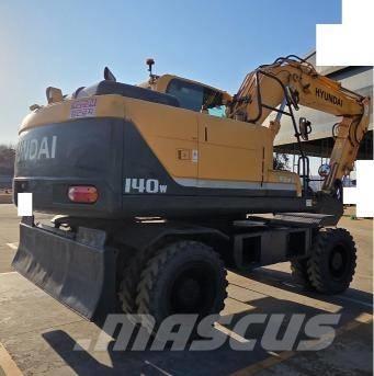 Hyundai Robex 140 W حفارات بعجل