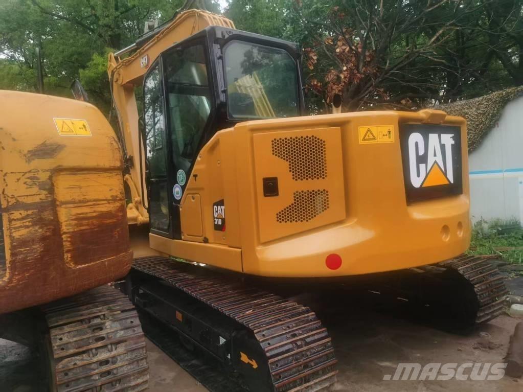 CAT 310 حفارات زحافة