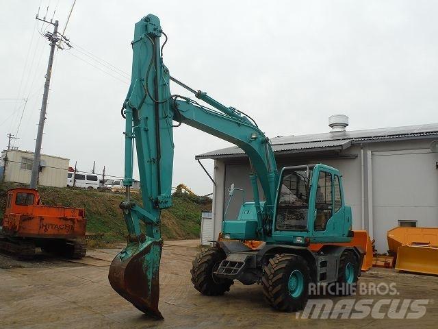 Kobelco SK100W حفارات بعجل