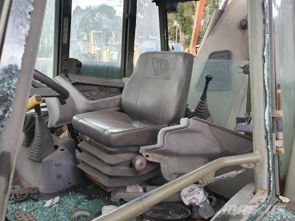 JCB 4 CX لوادر ذات جرافات عكسية