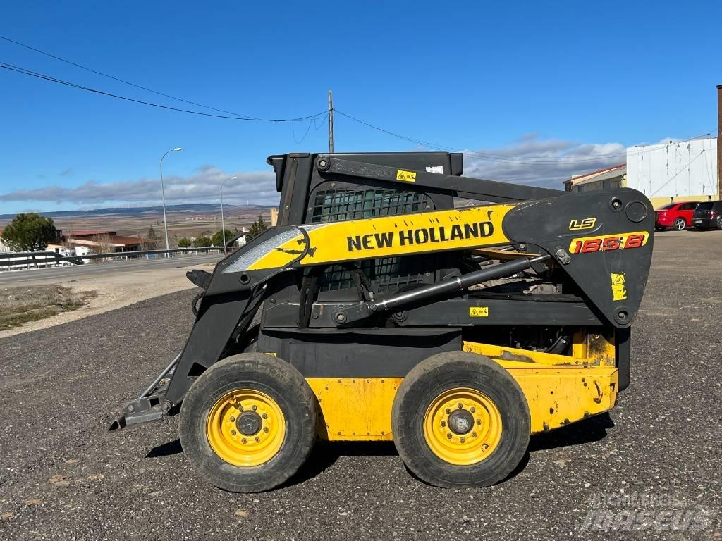 New Holland LS 185 B لوادر انزلاقية التوجيه
