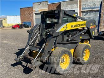 New Holland LS 185 B لوادر انزلاقية التوجيه
