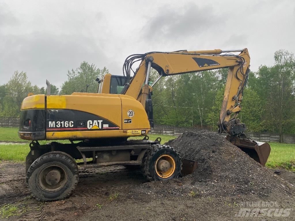CAT M 316 C حفارات بعجل