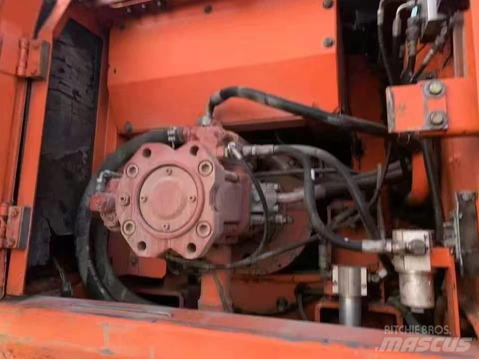 Doosan DH 210 W-7 حفارات بعجل