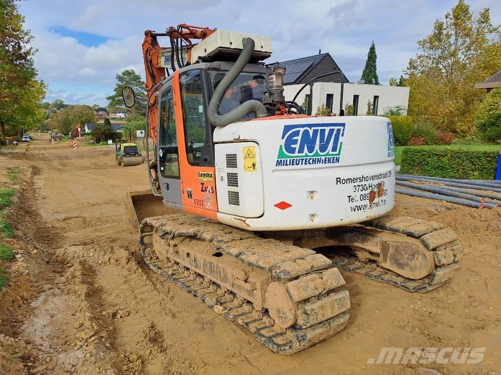 Hitachi ZX135US حفارات زحافة