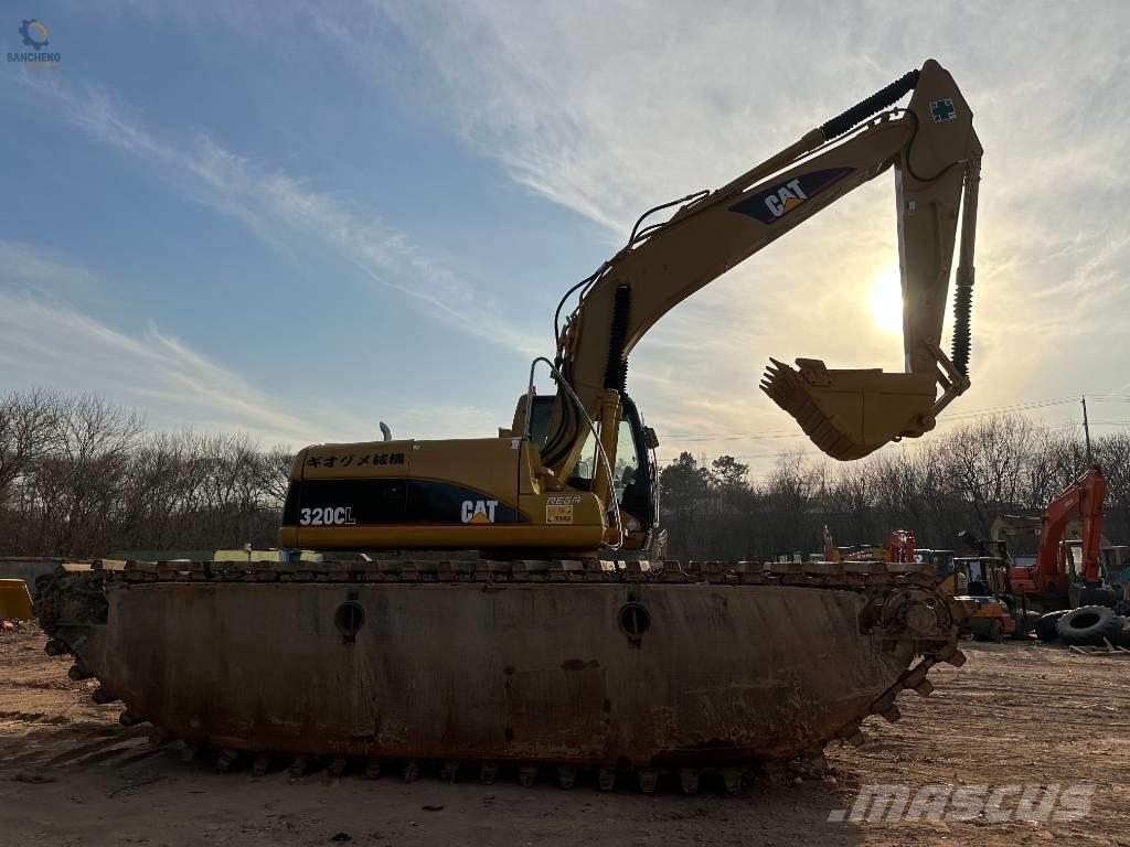 CAT 320CL الحفارات البرمائية