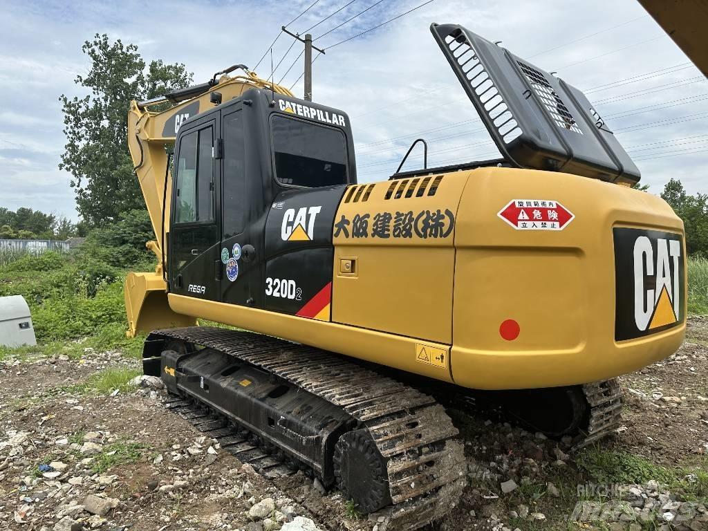 CAT 320 D حفارات زحافة