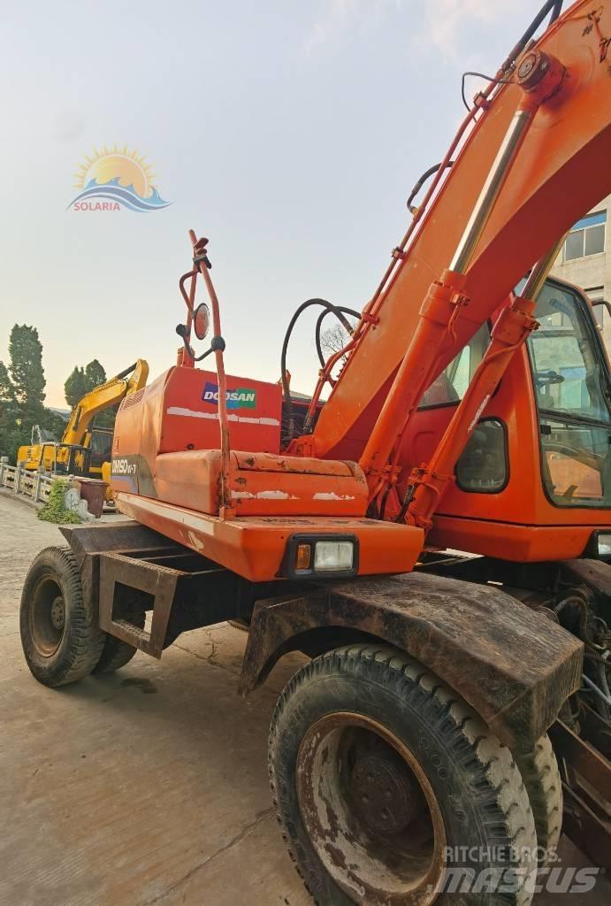 Doosan 150 W-7 حفارات بعجل