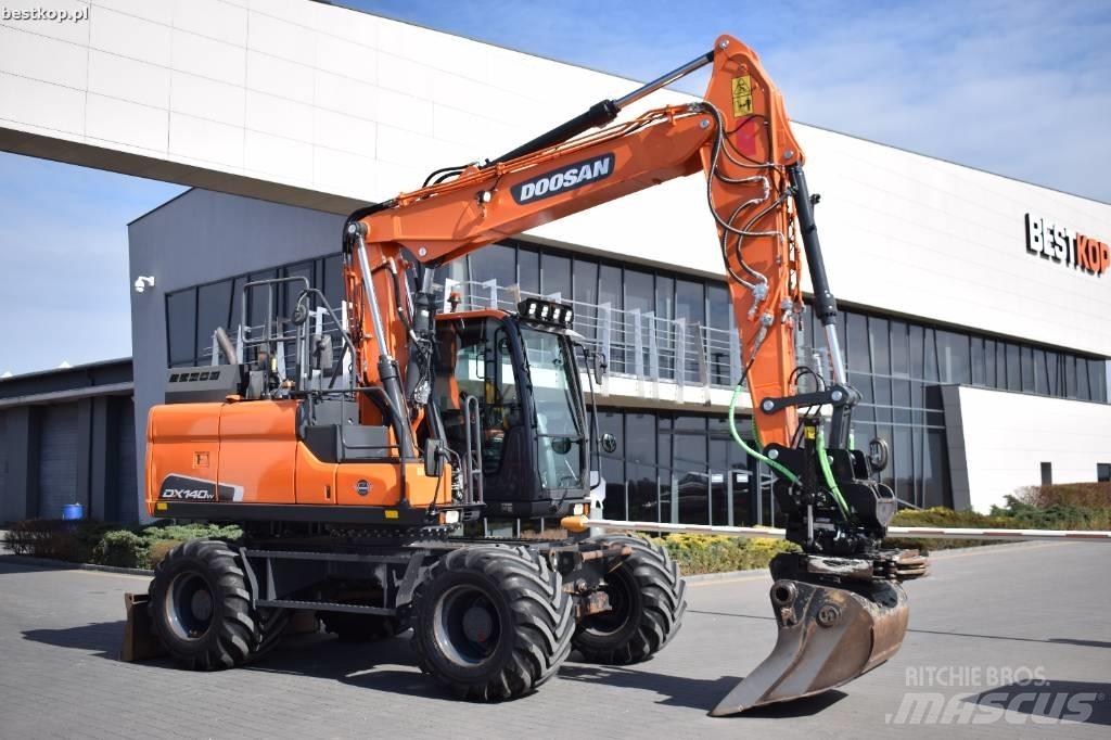 Doosan DX 140 W-5 حفارات بعجل