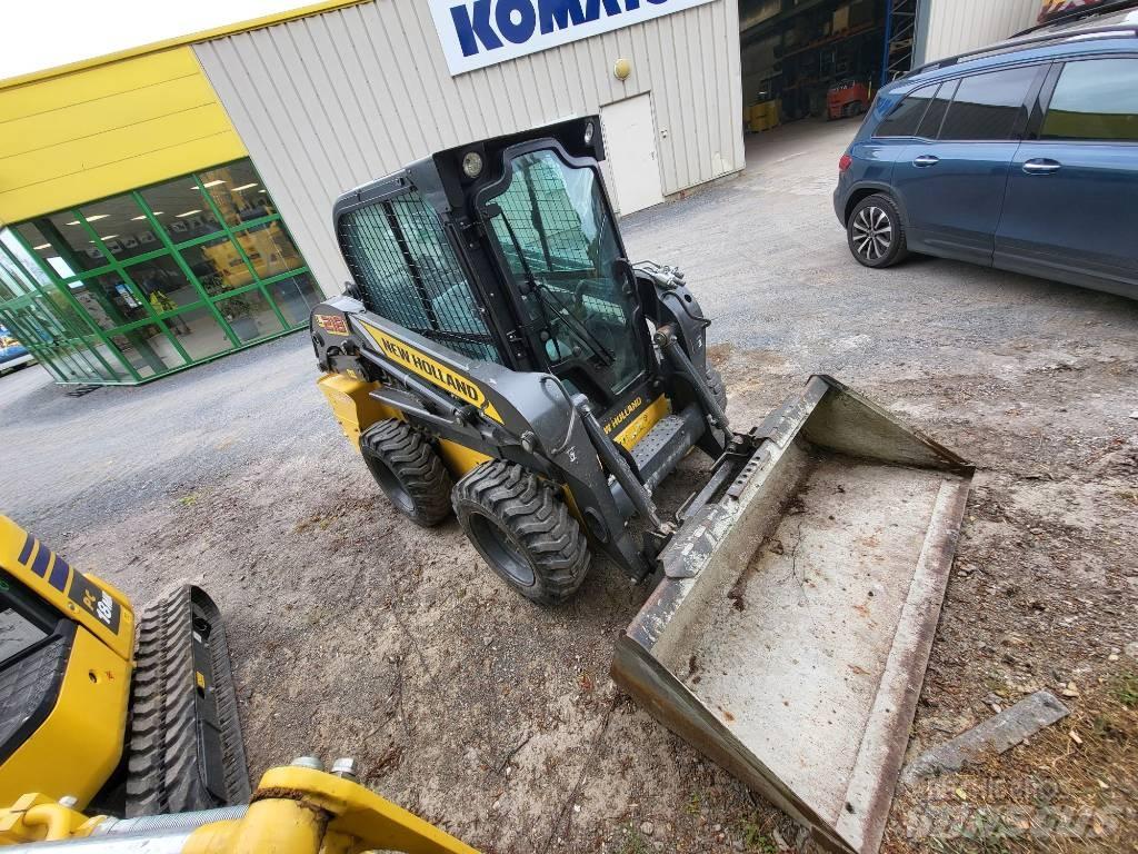 New Holland L218 لوادر انزلاقية التوجيه