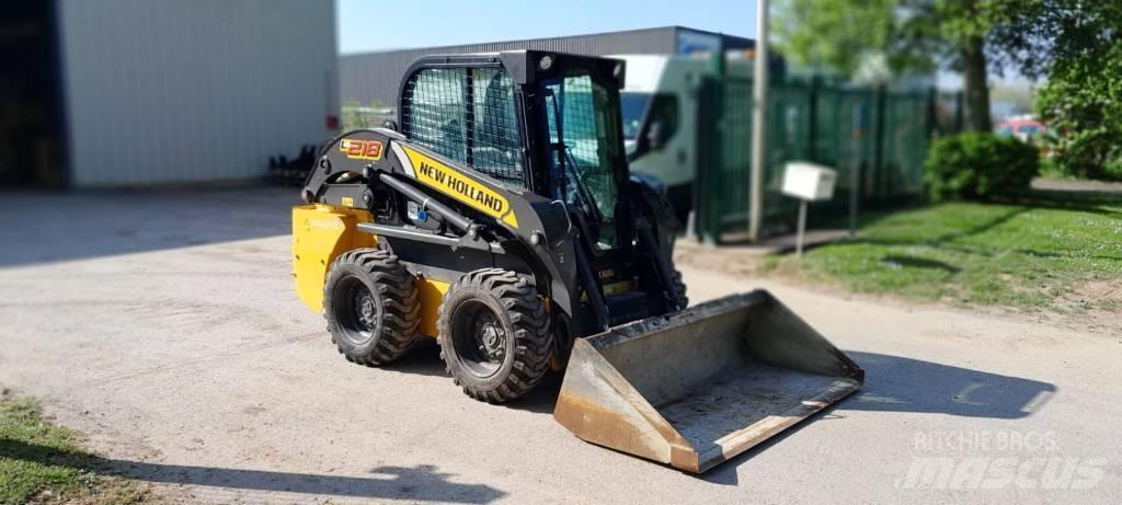 New Holland L218 لوادر انزلاقية التوجيه