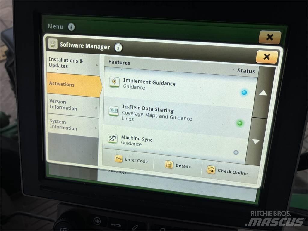 John Deere 6215R الجرارات