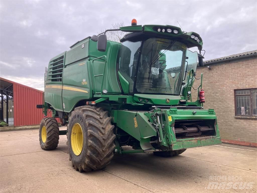 John Deere T670 HM حصادات