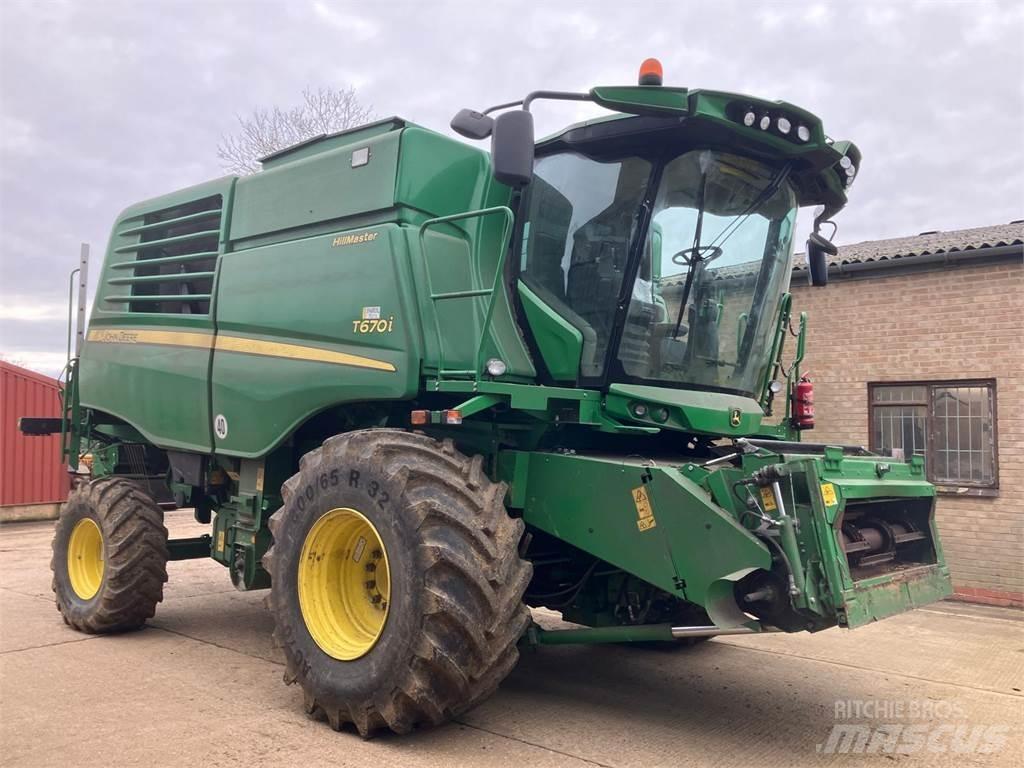 John Deere T670 HM حصادات