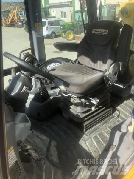 New Holland B 110 C لوادر ذات جرافات عكسية