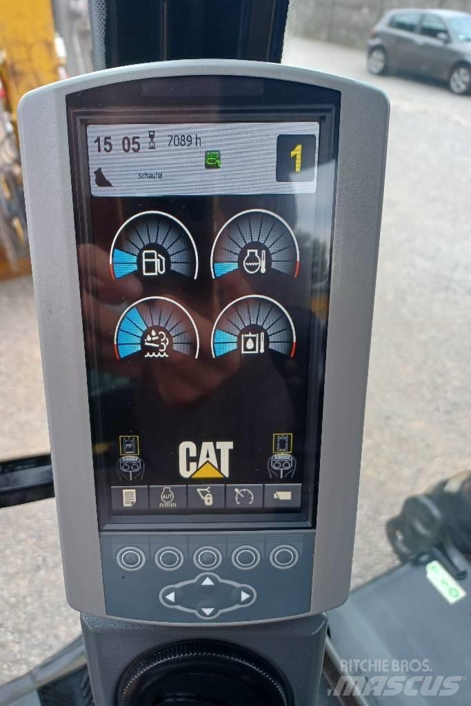 CAT 313 D حفارات بعجل